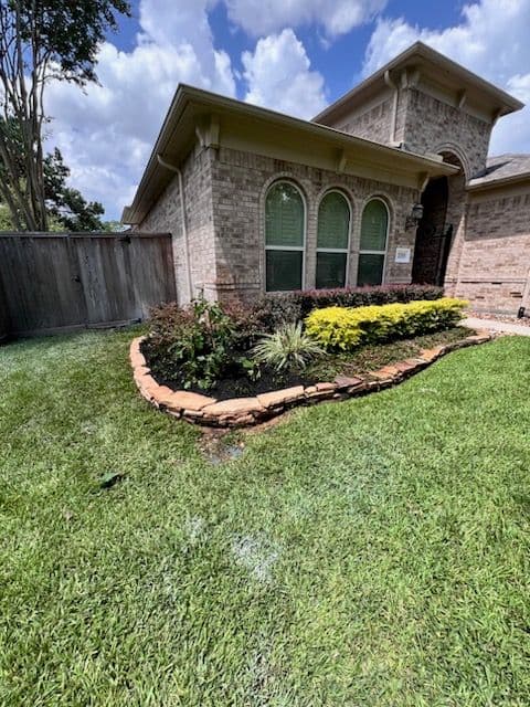Flower Bed Installation and Hardscape Edging Transformation image