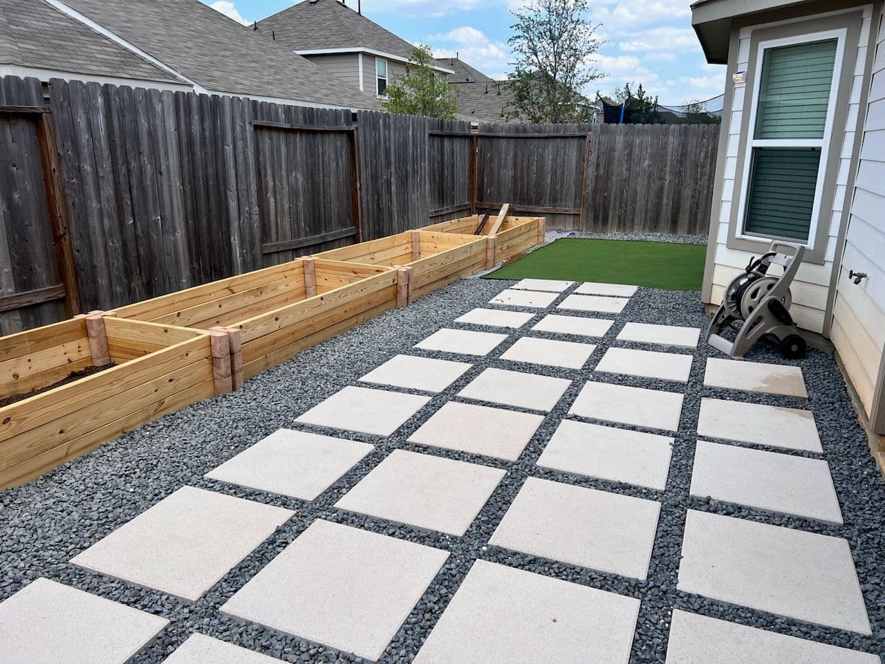 Modern Backyard Makeover with Pavers and Garden image