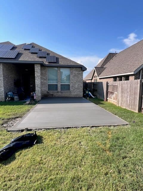 Project Sleek Backyard Concrete Patio Transformation image