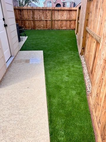 Gallery photos for Backyard Transformation with Artificial Turf and Patio Design: Image #2